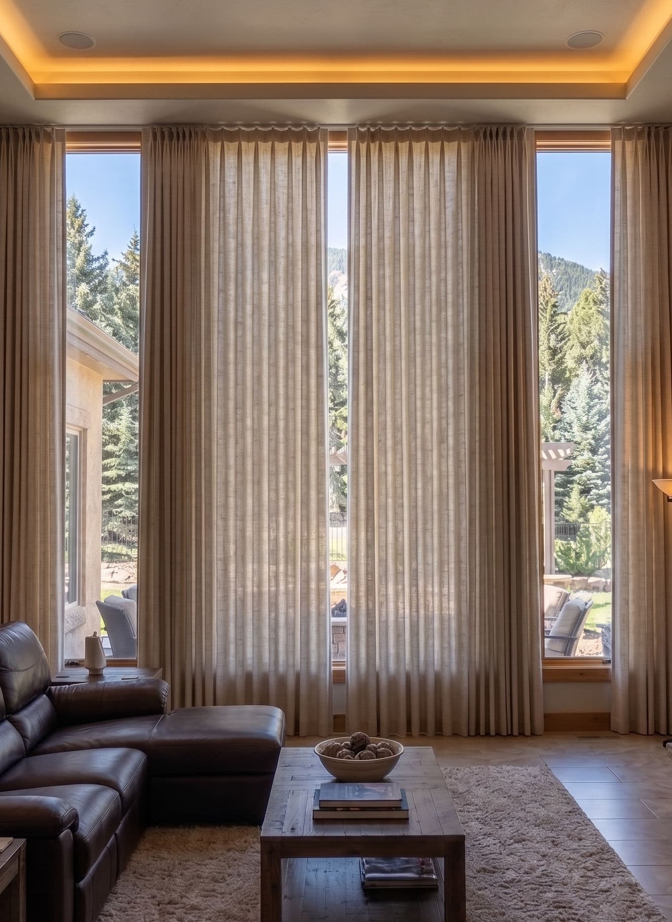 Floor-to-ceiling custom draperies in a mountain home